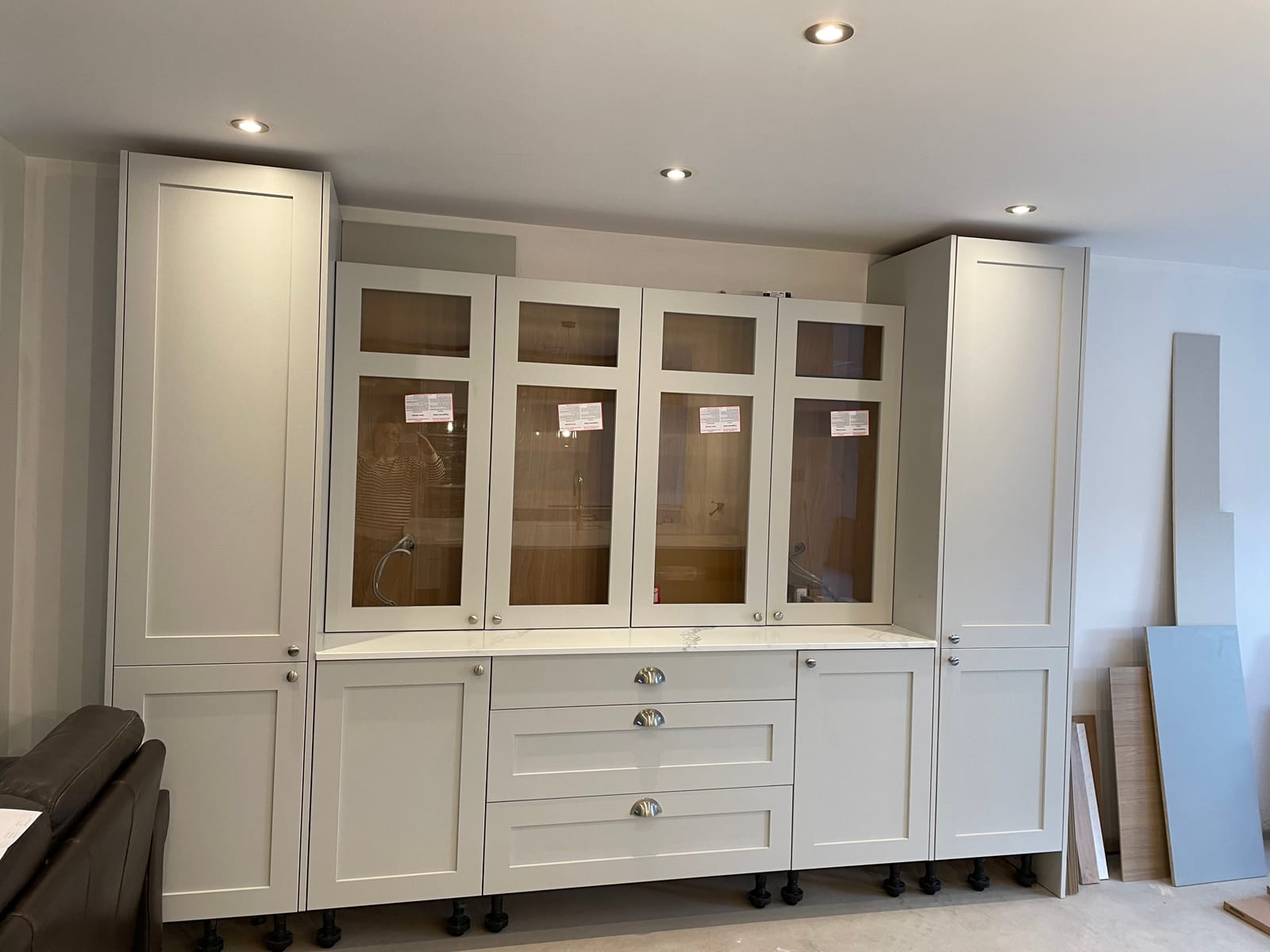 Fitted dresser cabinets with glazed upper doors