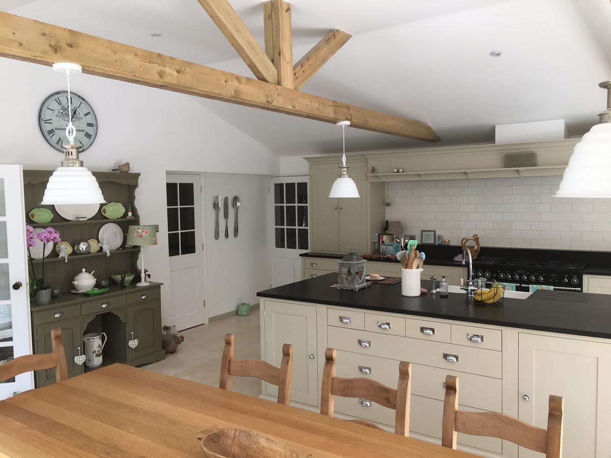 Open plan kitchen extension with exposed oak roof trusses