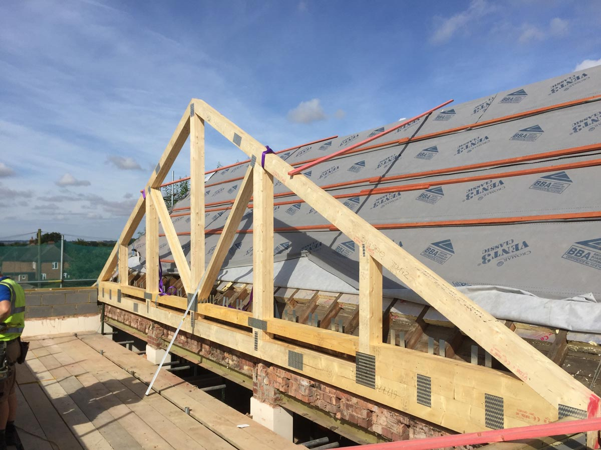 New roof trusses going up on a house extension